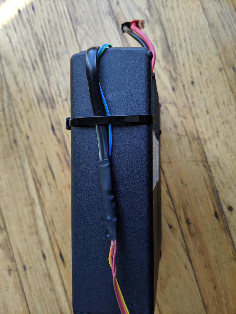 Side view of the radio. The three parts of the cable merge within a piece of
heat-shrink
tubing.